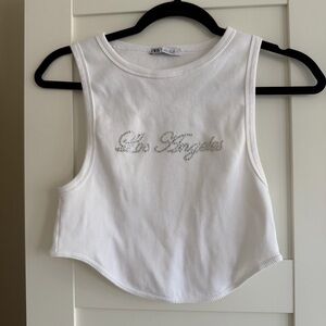 Zara White crop top with rhinestone "Los Angeles" detail. Size: L